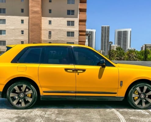 Rent a yellow Rolls-Royce Cullinan in Miami