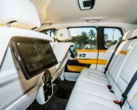 Rear seats and entertainment screens in the Rolls-Royce Cullinan Black Badge