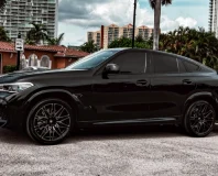 Graphite BMW X6 M Competition — side profile