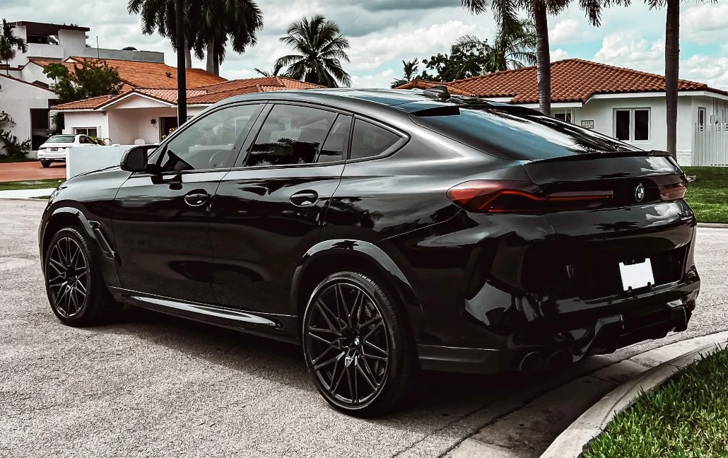 Graphite BMW X6 M Competition — rear three-quarter view