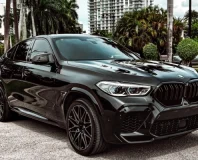 Graphite BMW X6 M Competition — front three-quarter exterior view