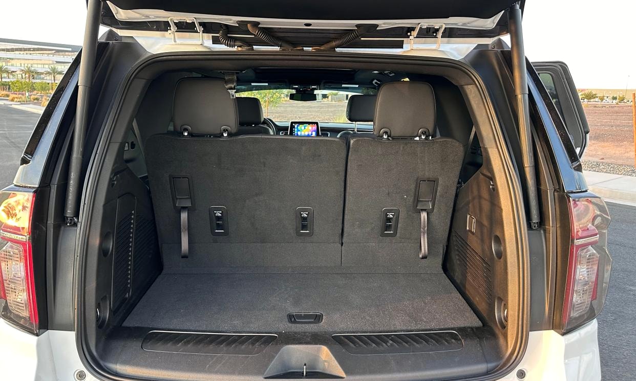 Open cargo area of the white Chevrolet Tahoe LT