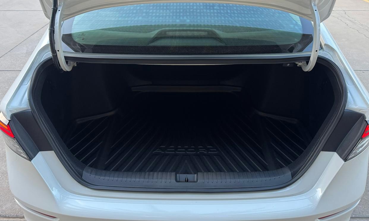 Open cargo area of the white Honda Accord LX
