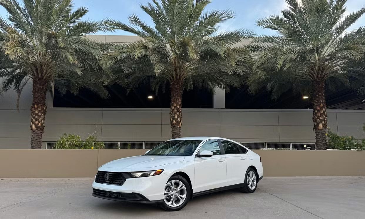 Front three-quarter view of the white Honda Accord LX