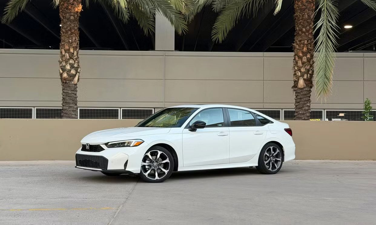 Front three-quarter view of the white Honda Civic Hybrid Sport Touring