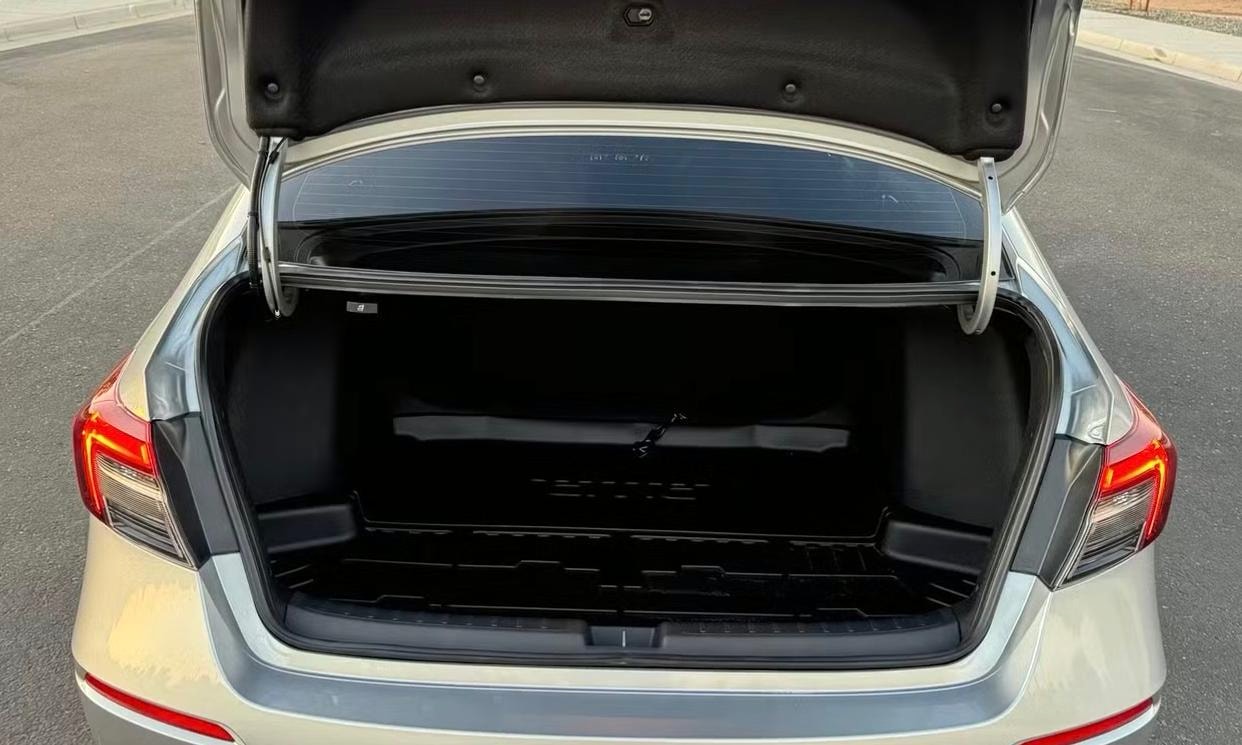 Open cargo area of the silver Honda Civic LX