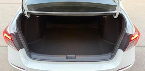 Open cargo area of the white Honda Civic Sport