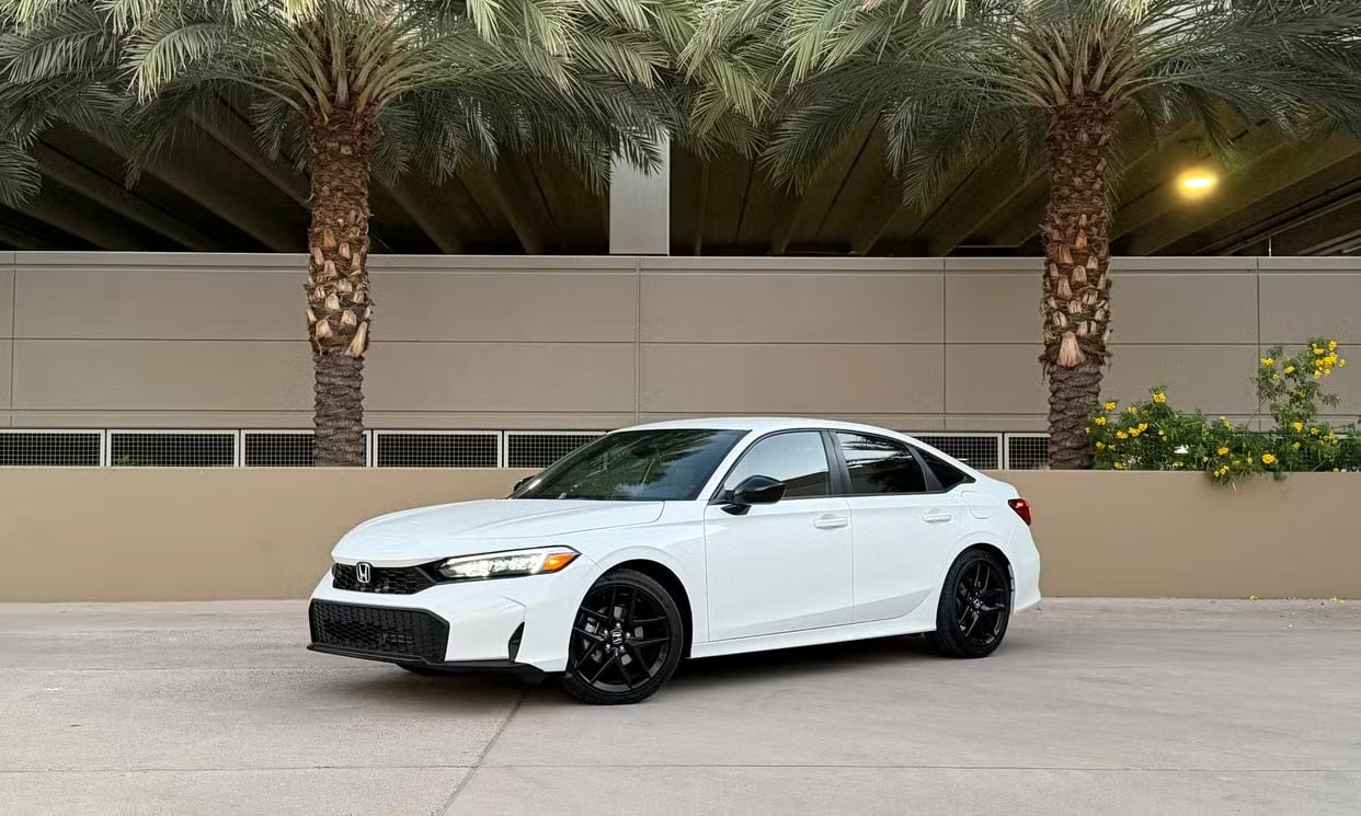 Front three-quarter view of the white Honda Civic Sport
