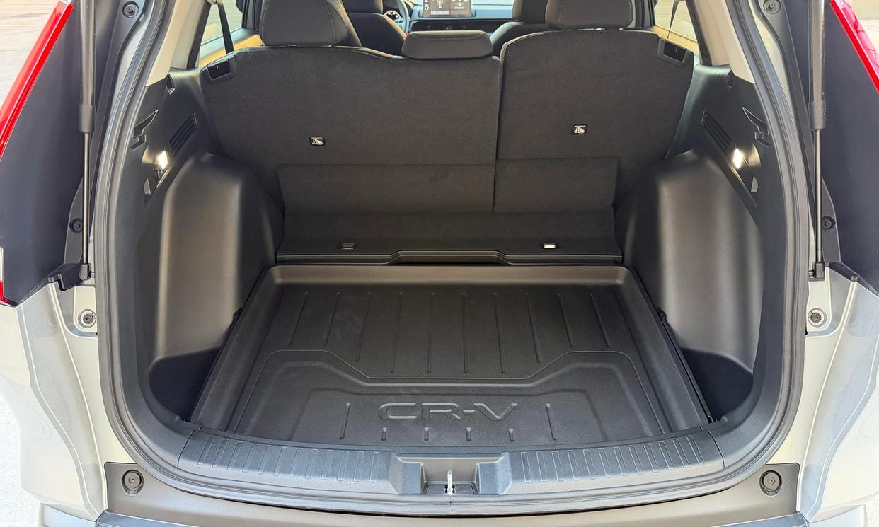 Open cargo area of the silver Honda CR-V LX