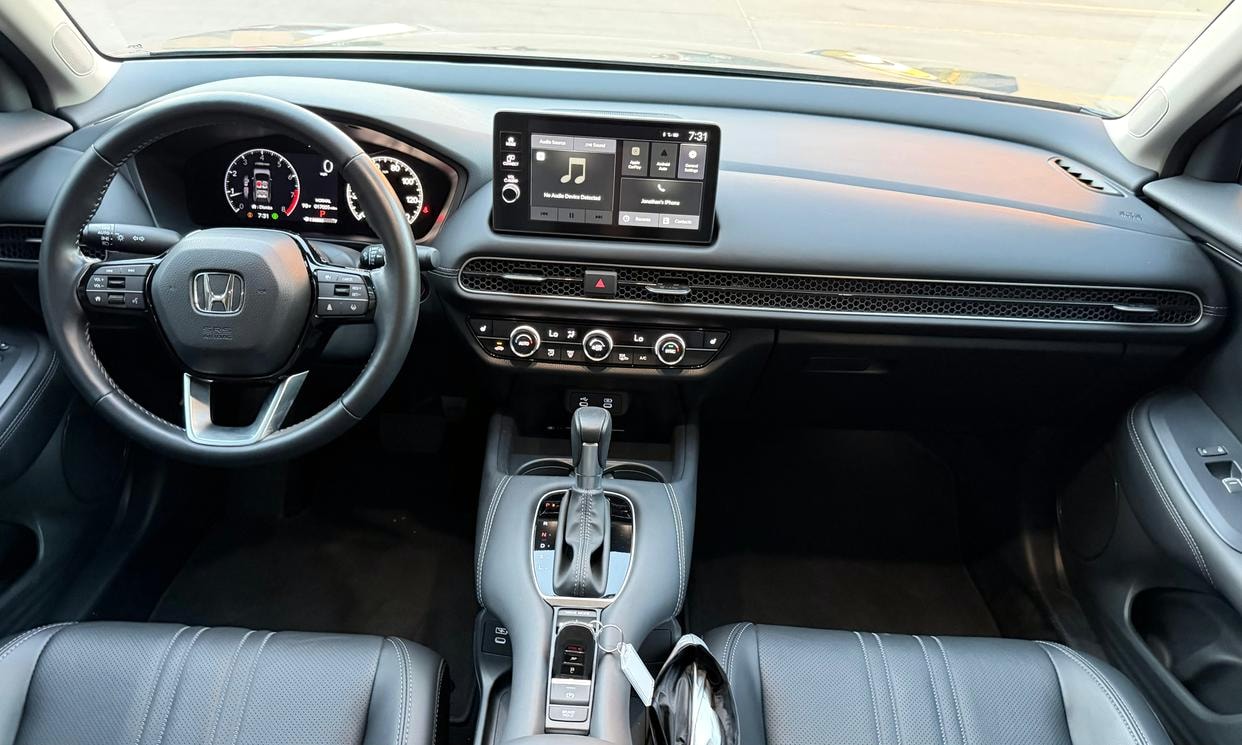 Dashboard and driving controls of the blue Honda HR-V EX-L