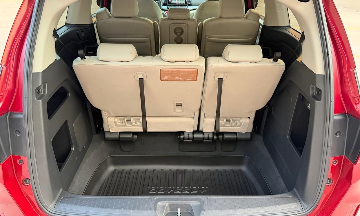 Open cargo area of the red Honda Odyssey EX-L