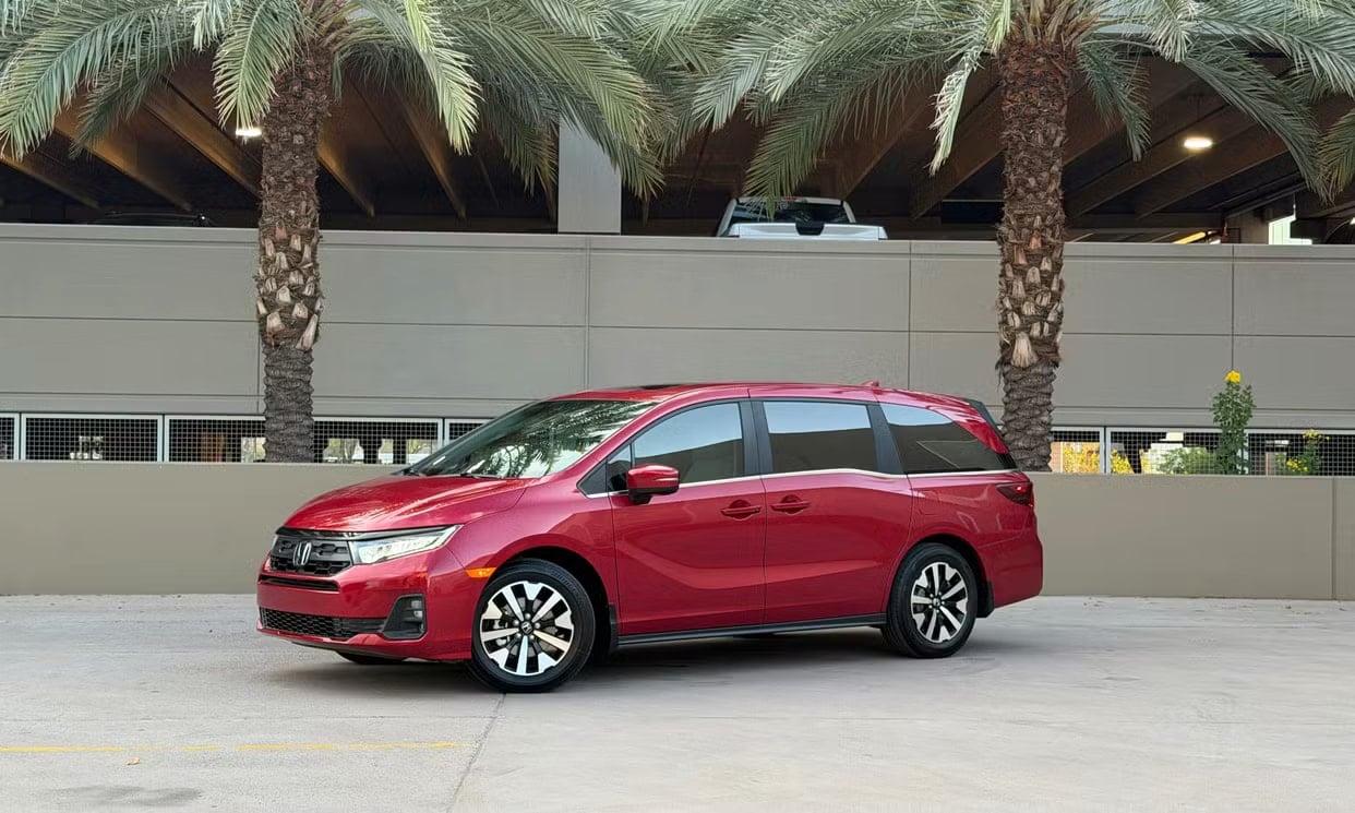 Front three-quarter view of the red Honda Odyssey EX-L