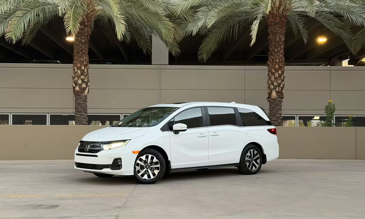 Front three-quarter view of the white Honda Odyssey EX-L