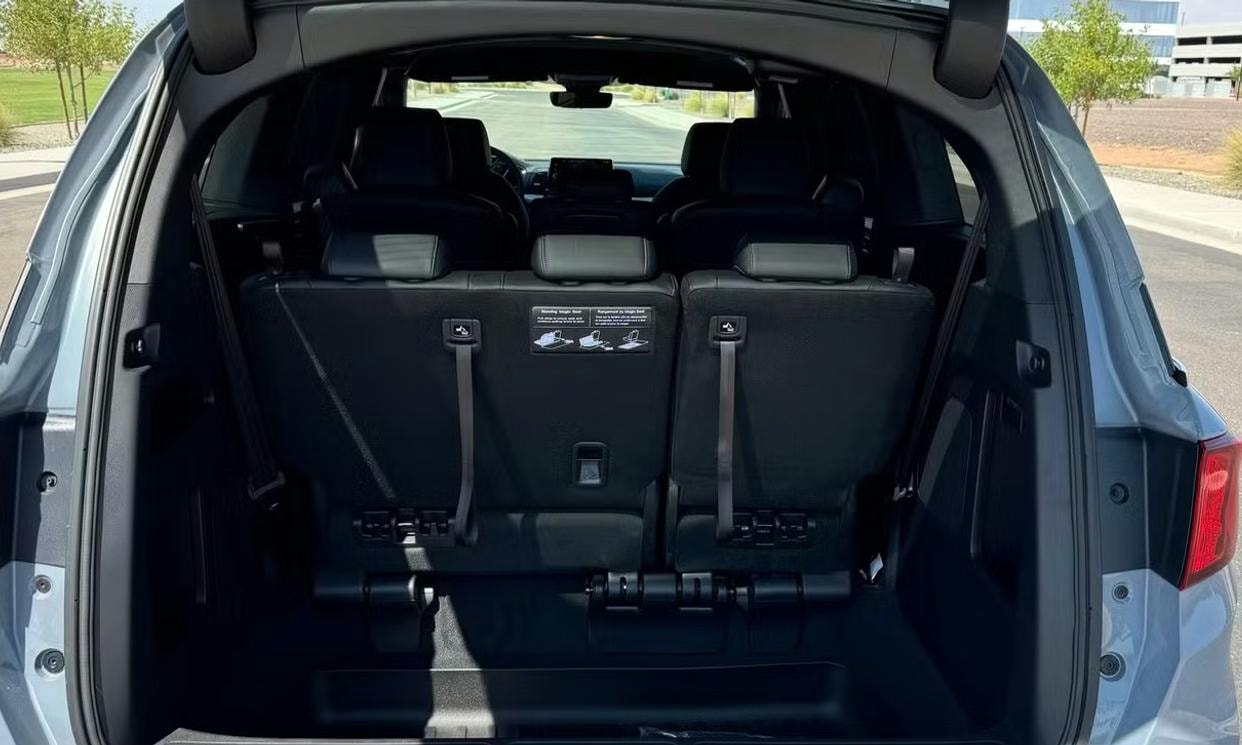 Open cargo area of the gray Honda Odyssey Sport-L