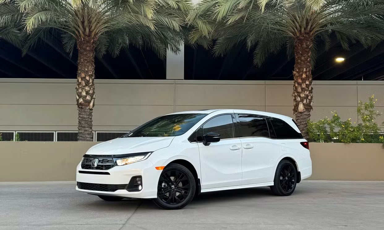 Front three-quarter view of the white Honda Odyssey Sport-L