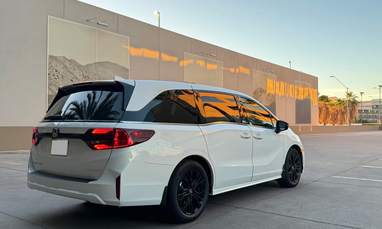 Rear three-quarter view of the white Honda Odyssey Sport-L