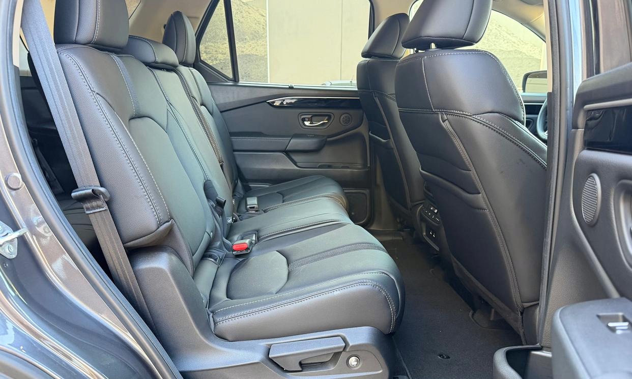 Passenger seating in the gray Honda Pilot EX-L