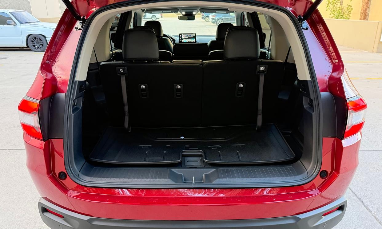 Open cargo area of the red Honda Pilot EX-L