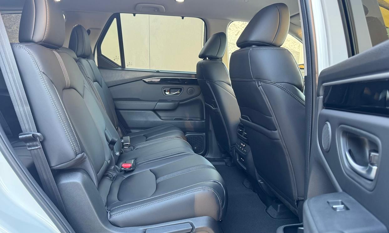 Passenger seating in the white Honda Pilot EX-L