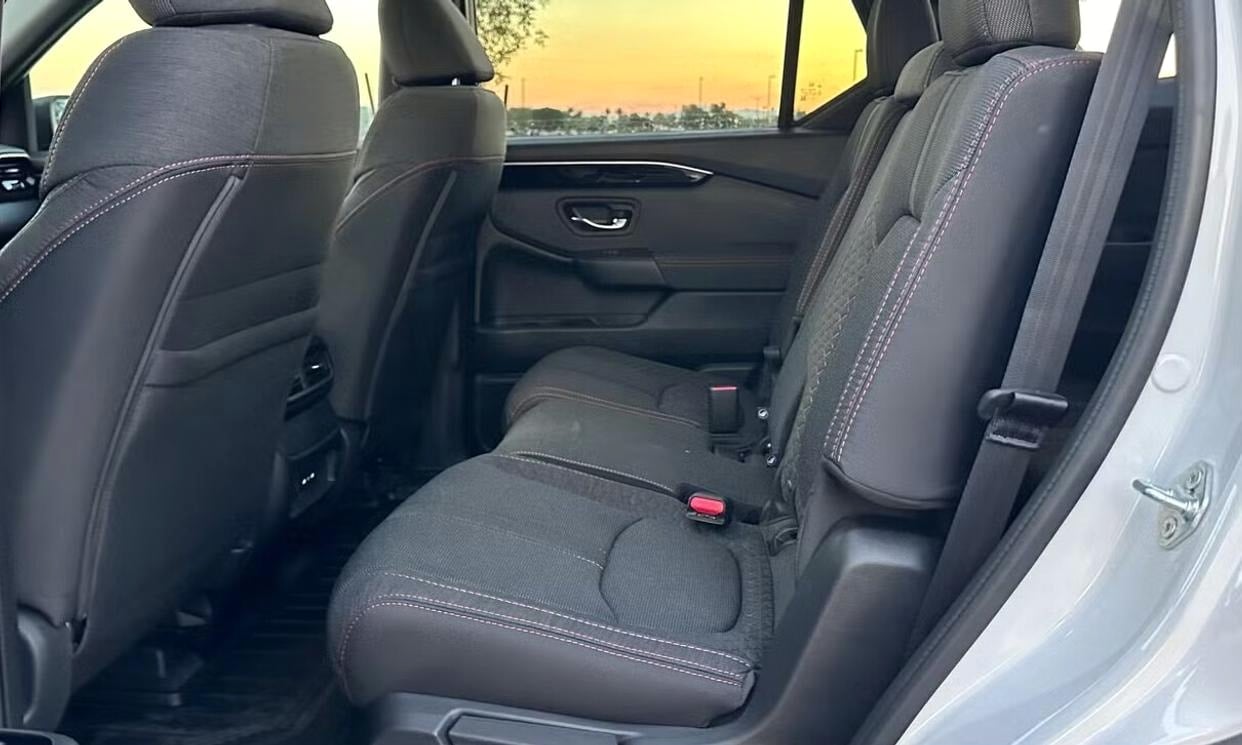 Passenger seating in the white Honda Pilot Sport