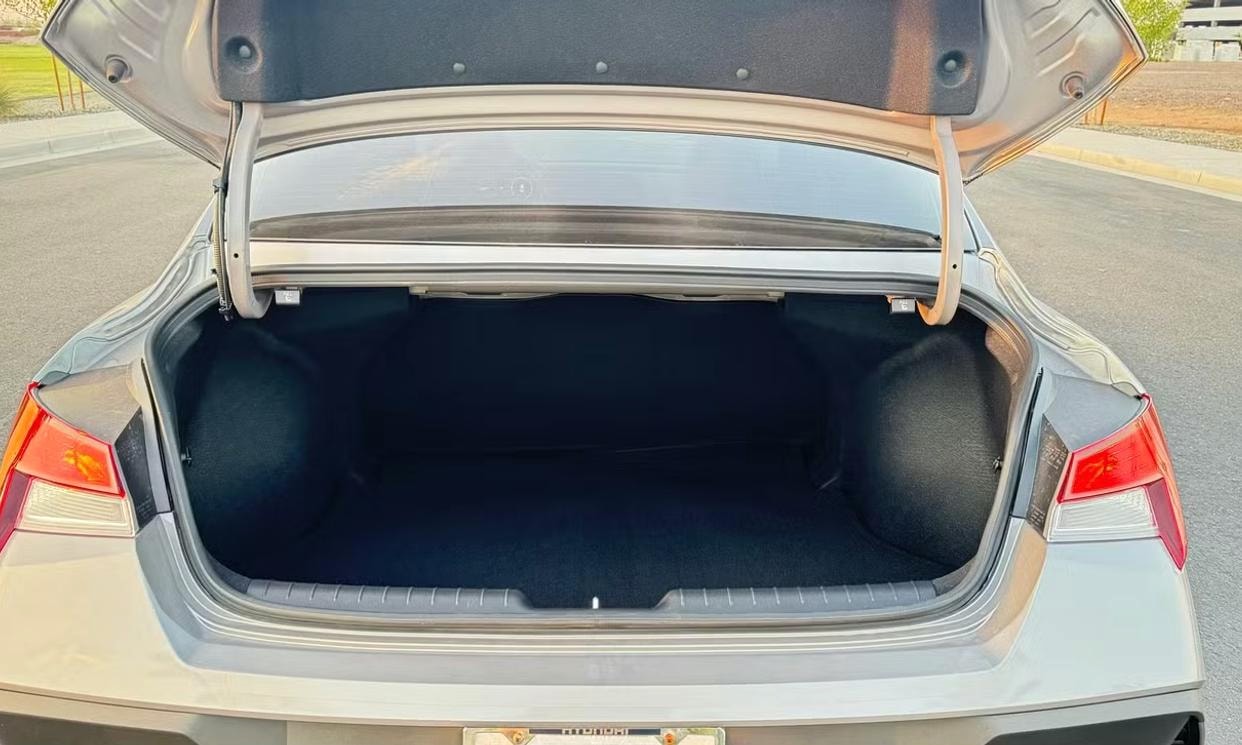 Open cargo area of the gray Hyundai Elantra SE