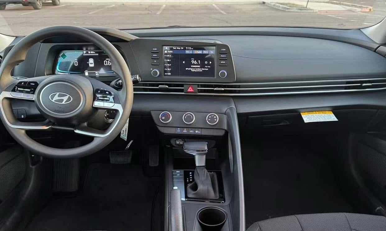 Dashboard and driving controls of the white Hyundai Elantra SE