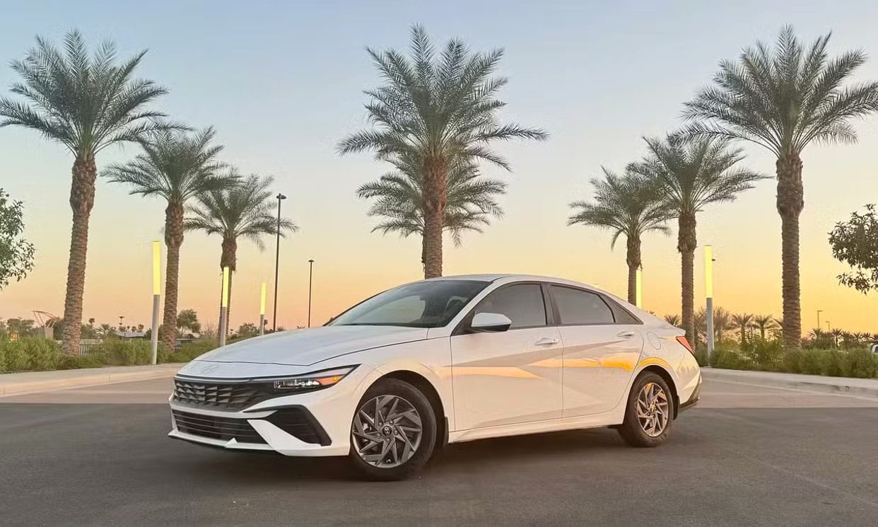 Front three-quarter view of the white Hyundai Elantra SE