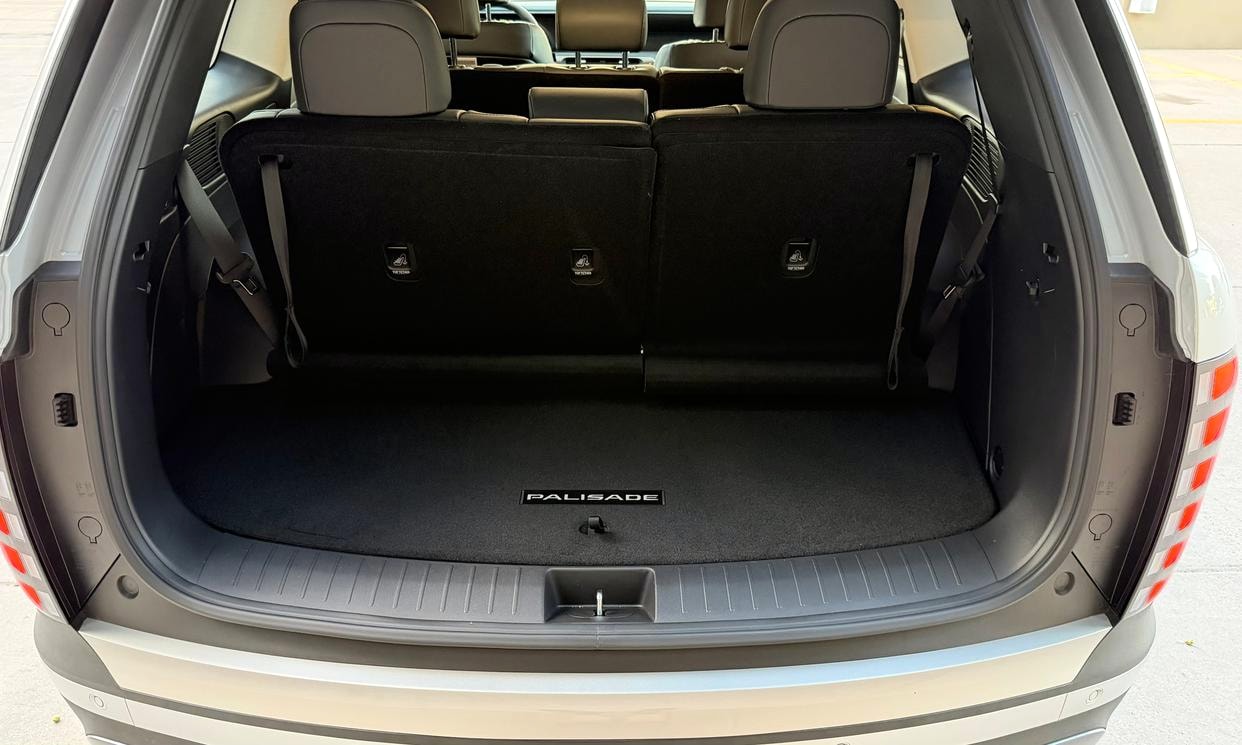 Open cargo area of the silver Hyundai Palisade SEL 8P
