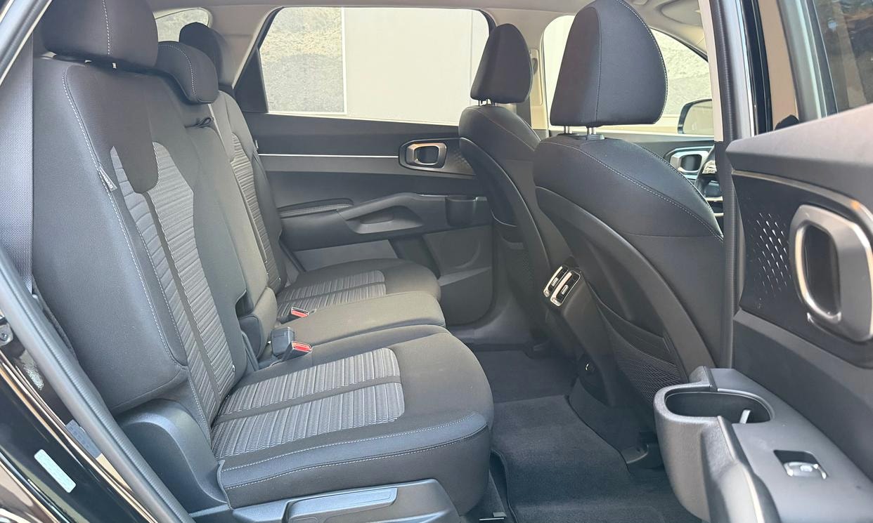 Passenger seating in the black Kia Sorento LX