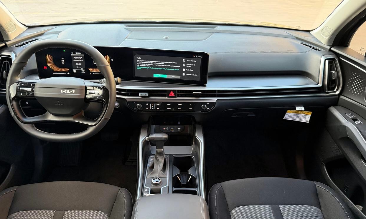 Dashboard and driving controls of the gray Kia Sorento LX