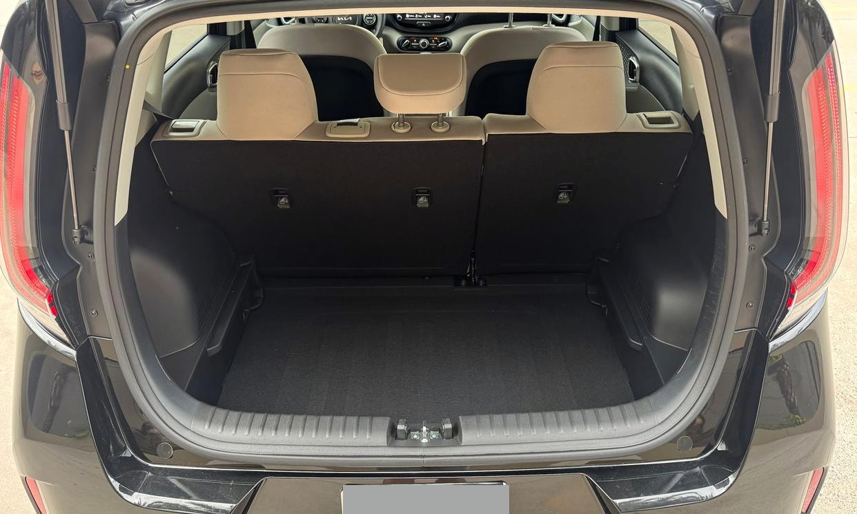 Open cargo area of the black Kia Soul LX