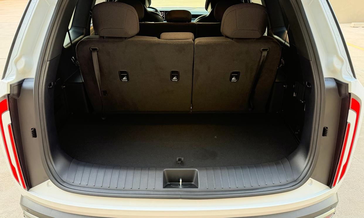 Open cargo area of the white Kia Telluride LX