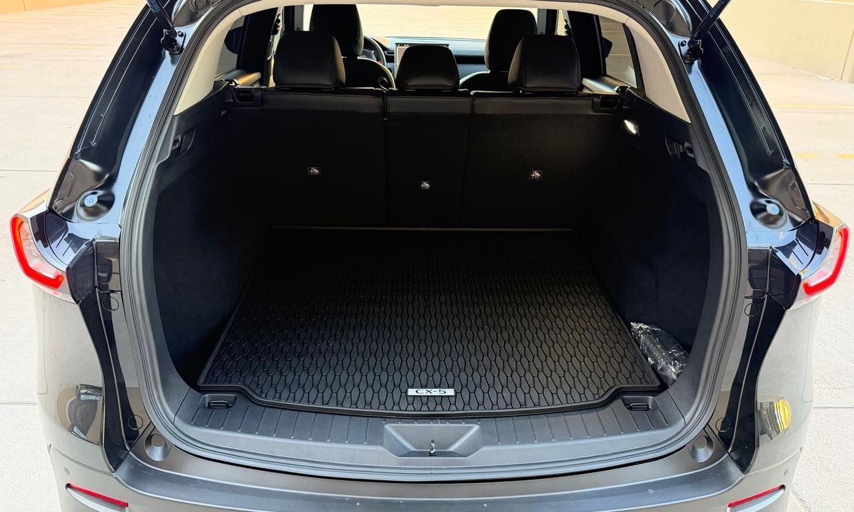 Open cargo area of the black Mazda CX-5 2.5 S Select