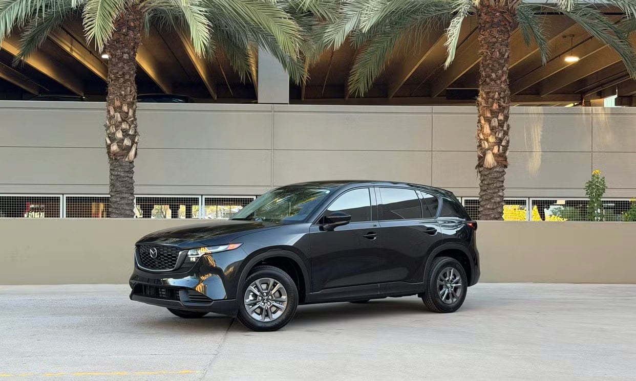 Front three-quarter view of the black Mazda CX-5 2.5 S Select
