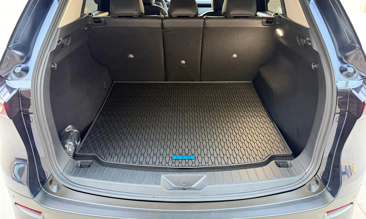 Open cargo area of the blue Mazda CX-5 2.5 S Select