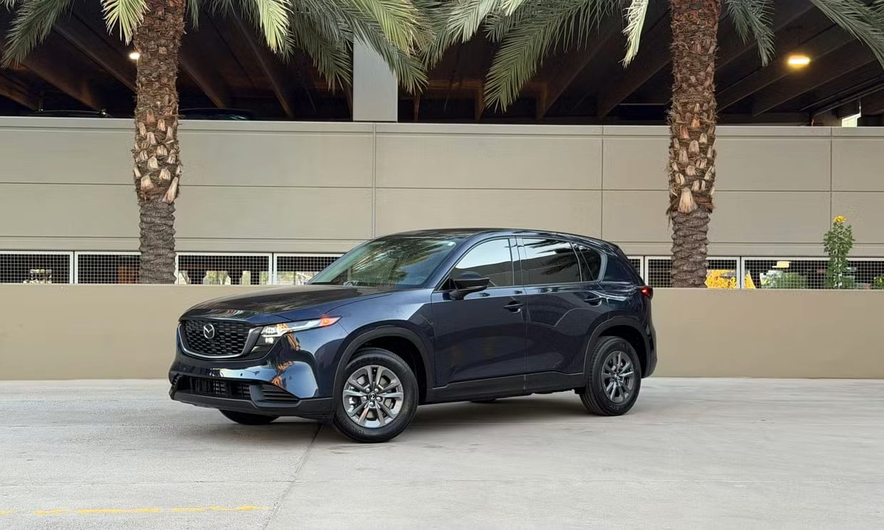 Front three-quarter view of the blue Mazda CX-5 2.5 S Select