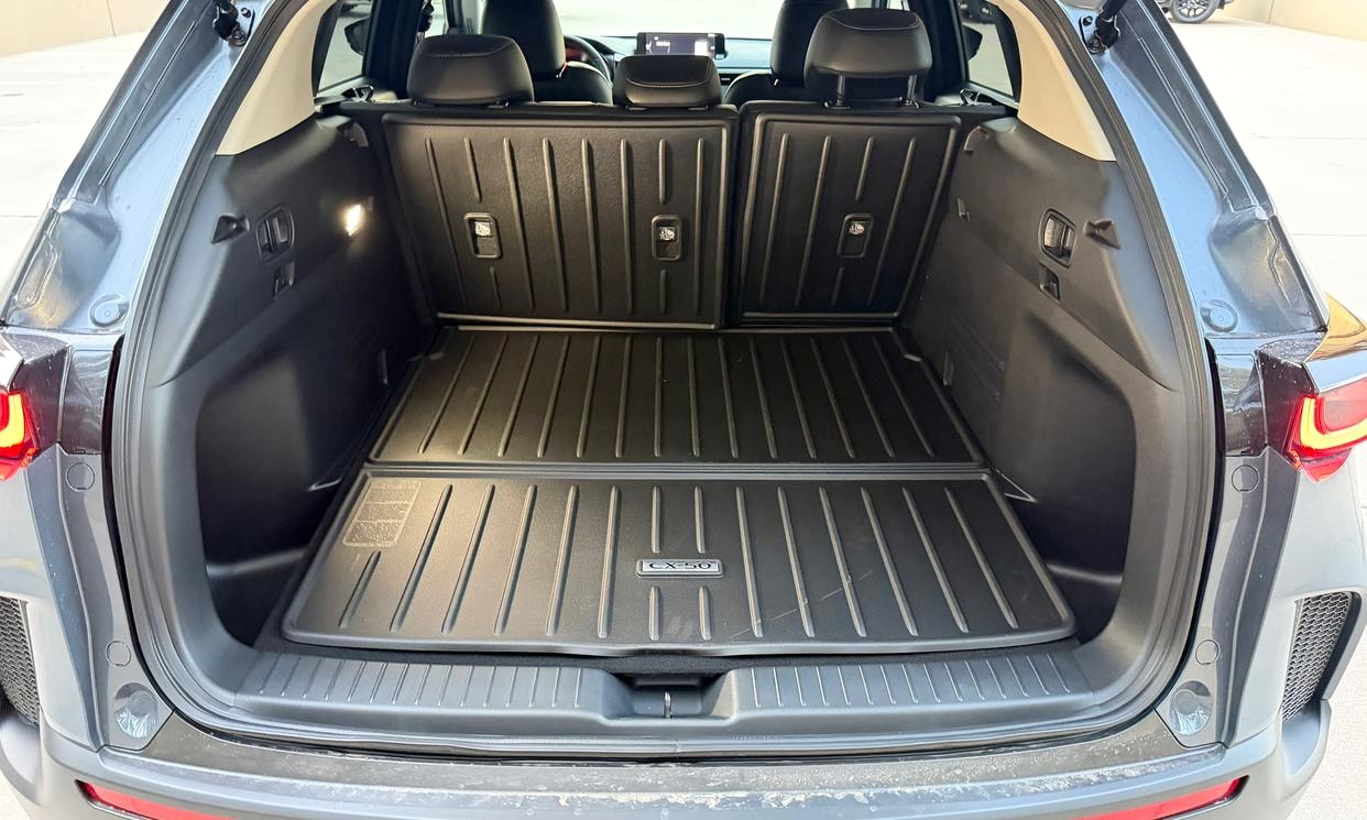 Open cargo area of the gray Mazda CX-50 2.5 S Select