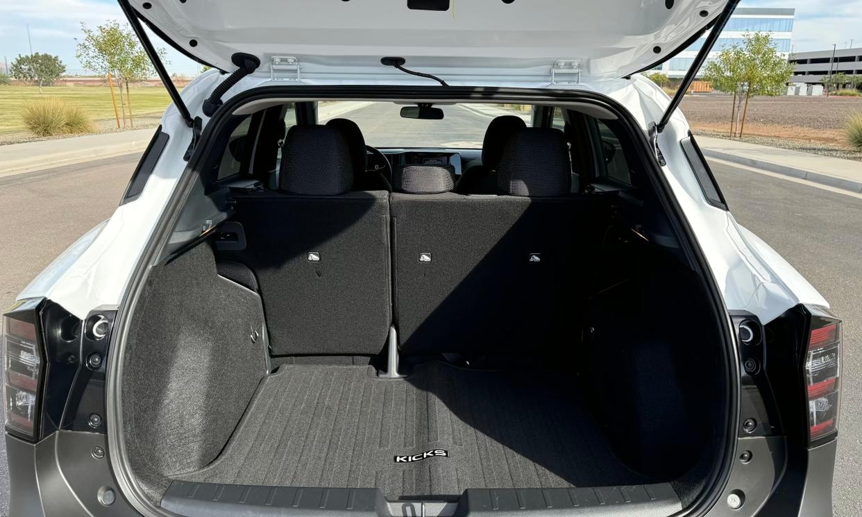 Open cargo area of the white Nissan Kicks S