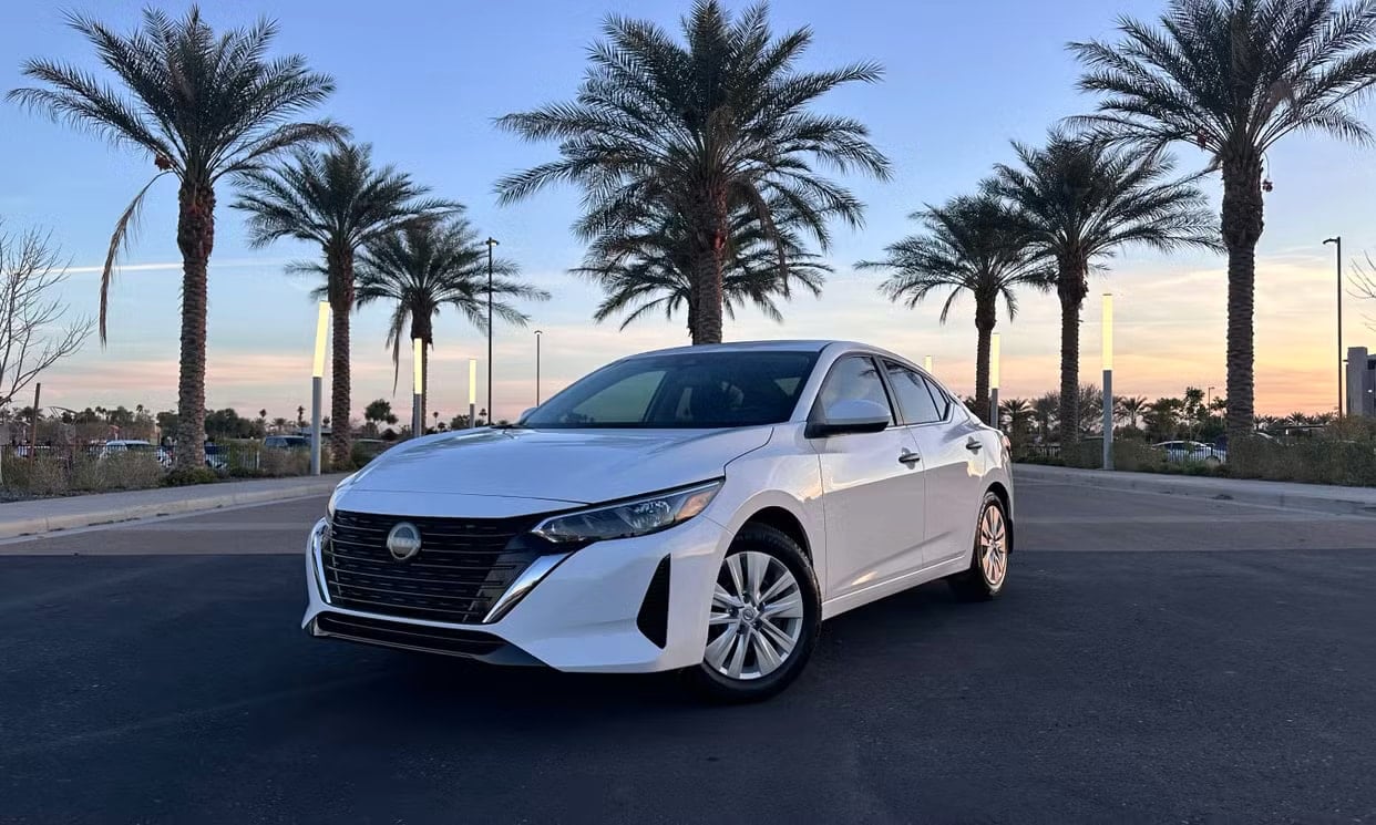 Front three-quarter view of the white Nissan Sentra S