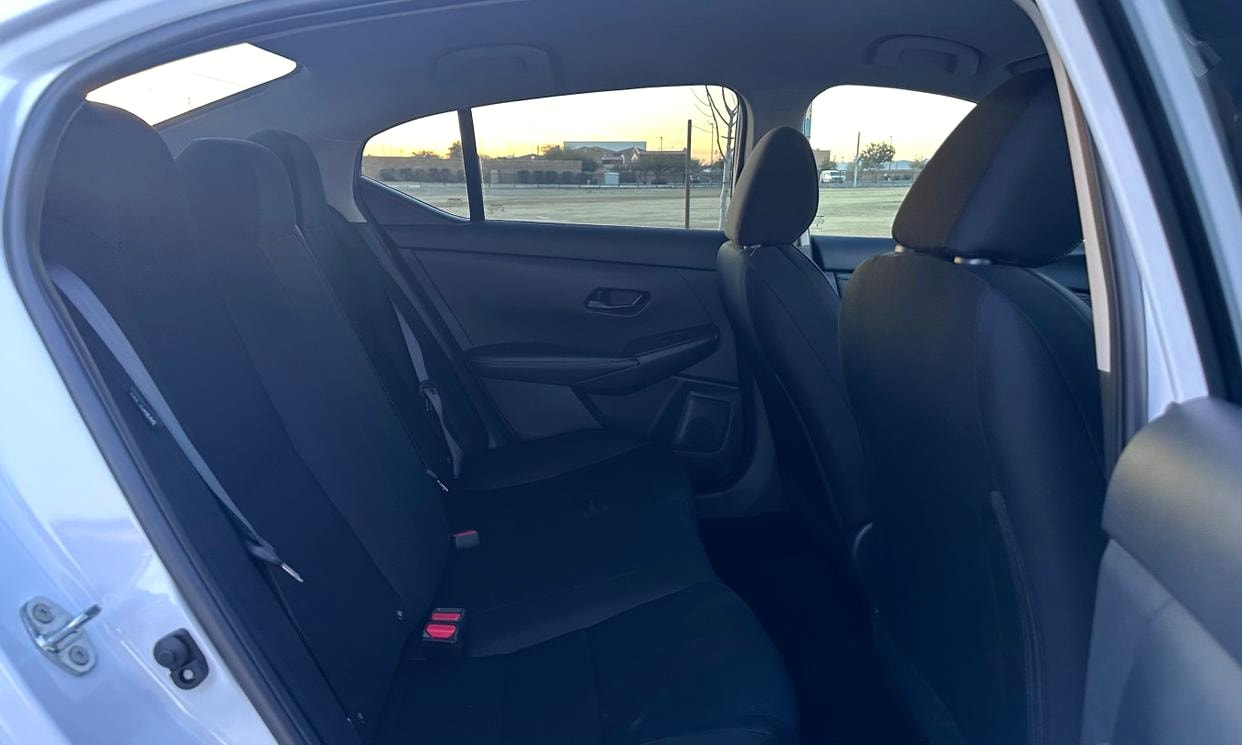 Passenger seating in the white Nissan Sentra S