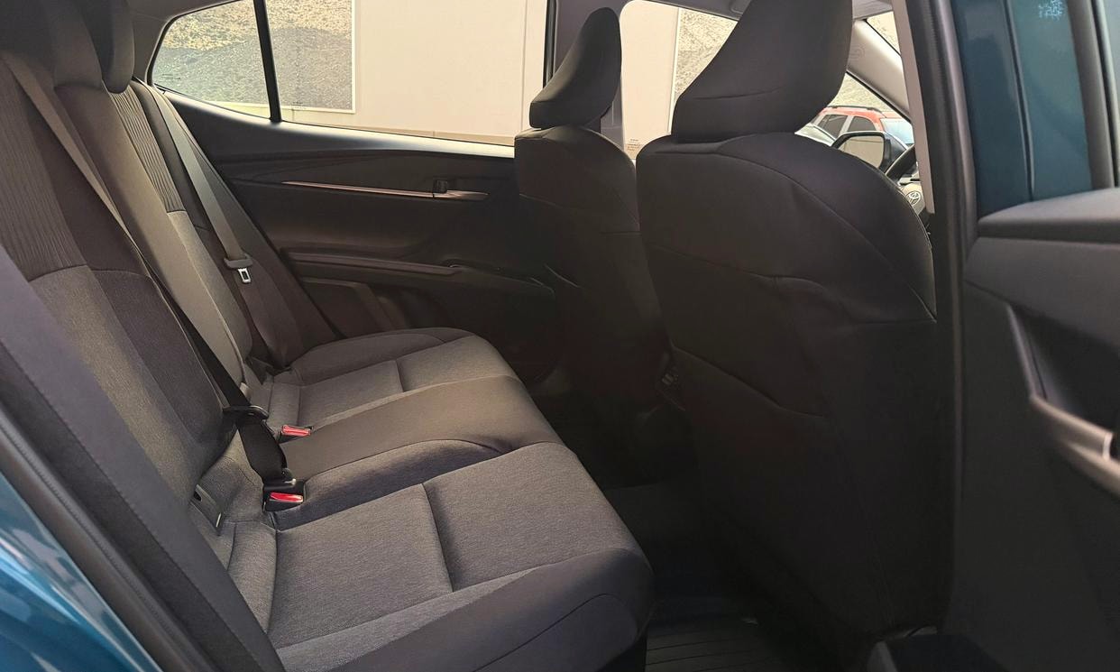 Passenger seating in the blue Toyota Camry Hybrid LE