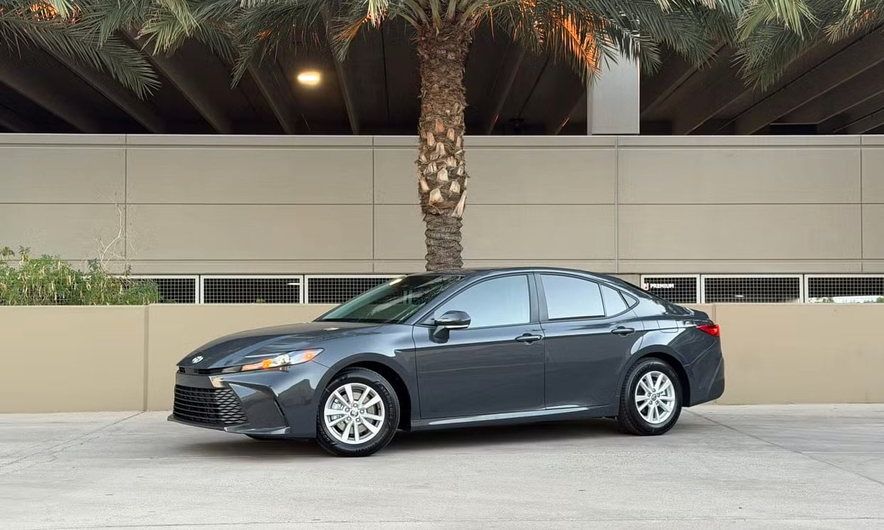 Front three-quarter view of the gray Toyota Camry Hybrid LE
