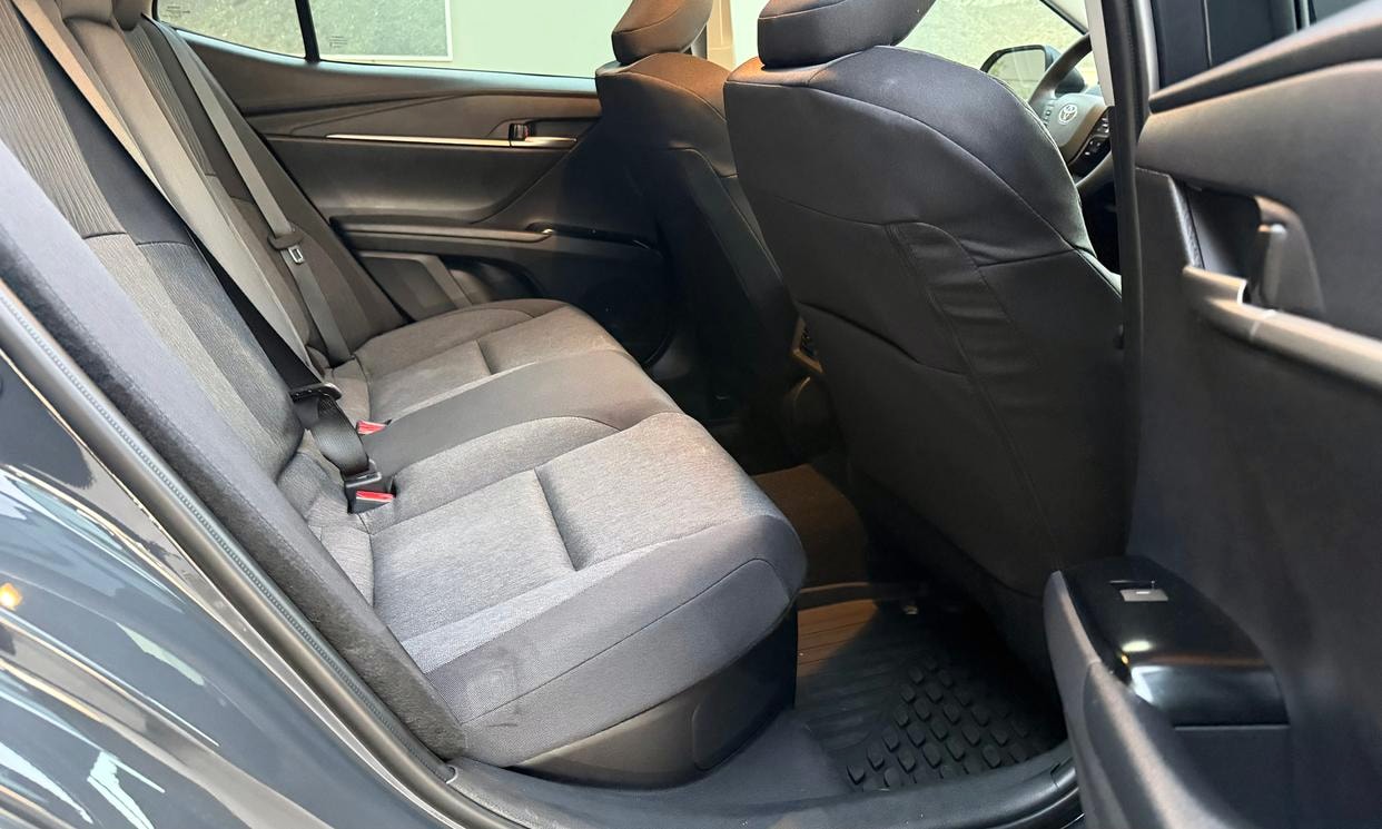 Passenger seating in the gray Toyota Camry Hybrid LE