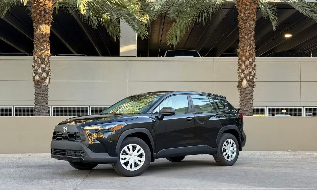 Front three-quarter view of the black Toyota Corolla Cross L