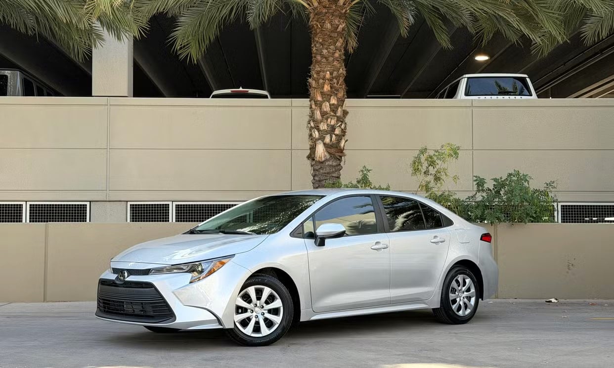 Front three-quarter view of the silver Toyota Corolla LE
