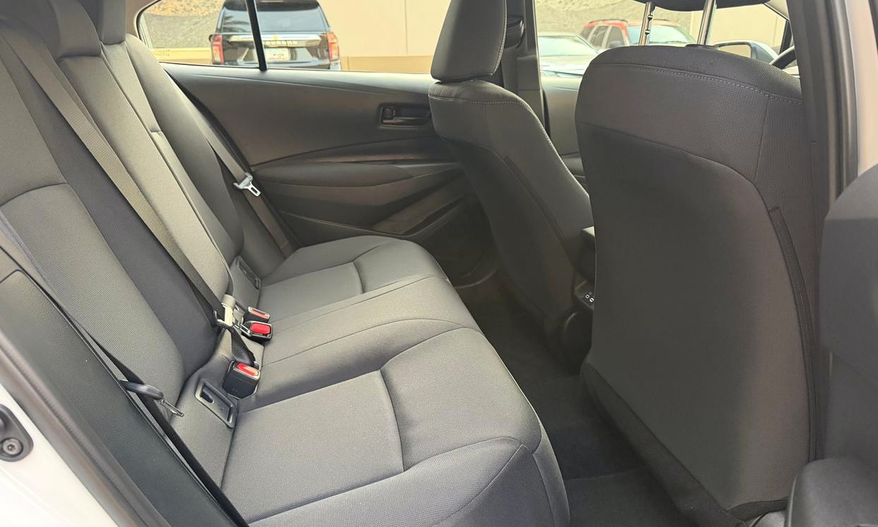 Passenger seating in the white Toyota Corolla LE