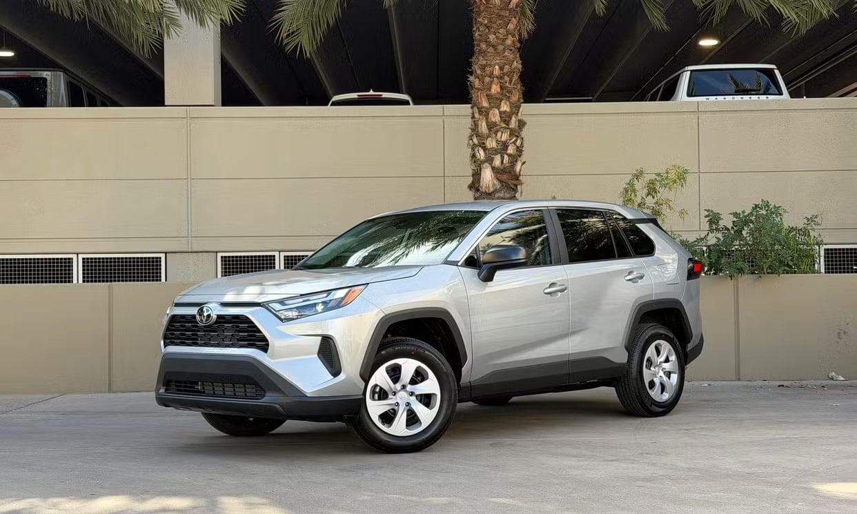 Front three-quarter view of the silver Toyota RAV4 LE