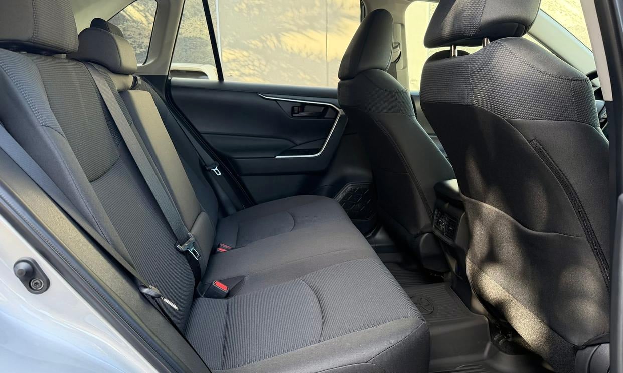 Passenger seating in the silver Toyota RAV4 LE