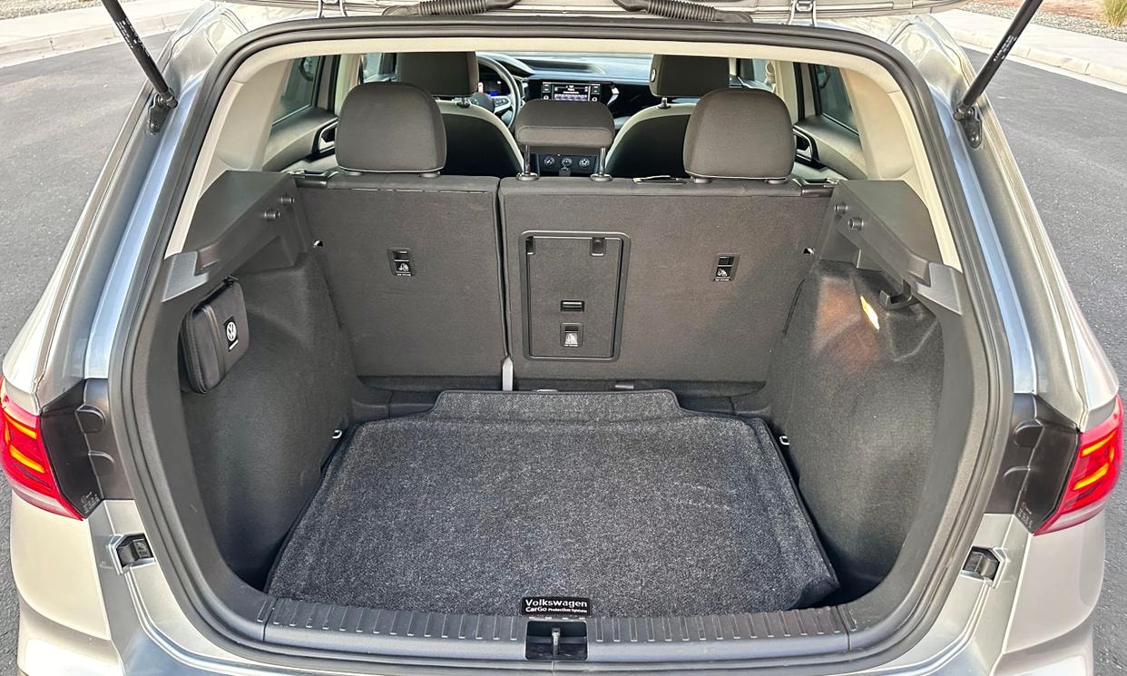 Open cargo area of the silver Volkswagen Taos S