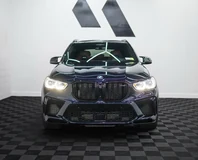 BMW X5 M — Dark blue, front view indoors